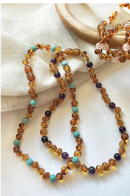 Collier bébé ambre et autres pierres